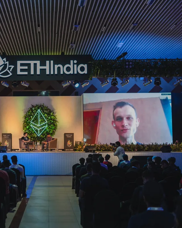 Vitalik Buterin on the big screen during his live AMA at ETHIndia 2022