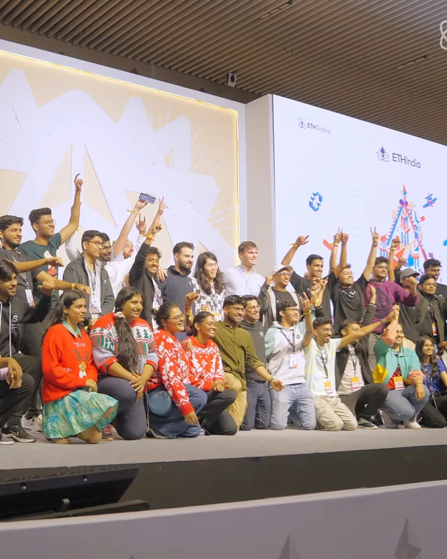 Builders cheering together on the ETHIndia 2023 stage